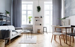 modern apartment with bright windows and modern furniture - tenant harassment claims concept